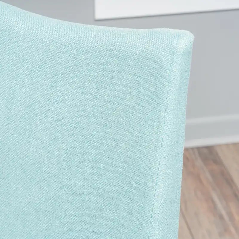 Chaise de salle à manger tapissée en tissu de style milieu du siècle avec pieds en bois massif