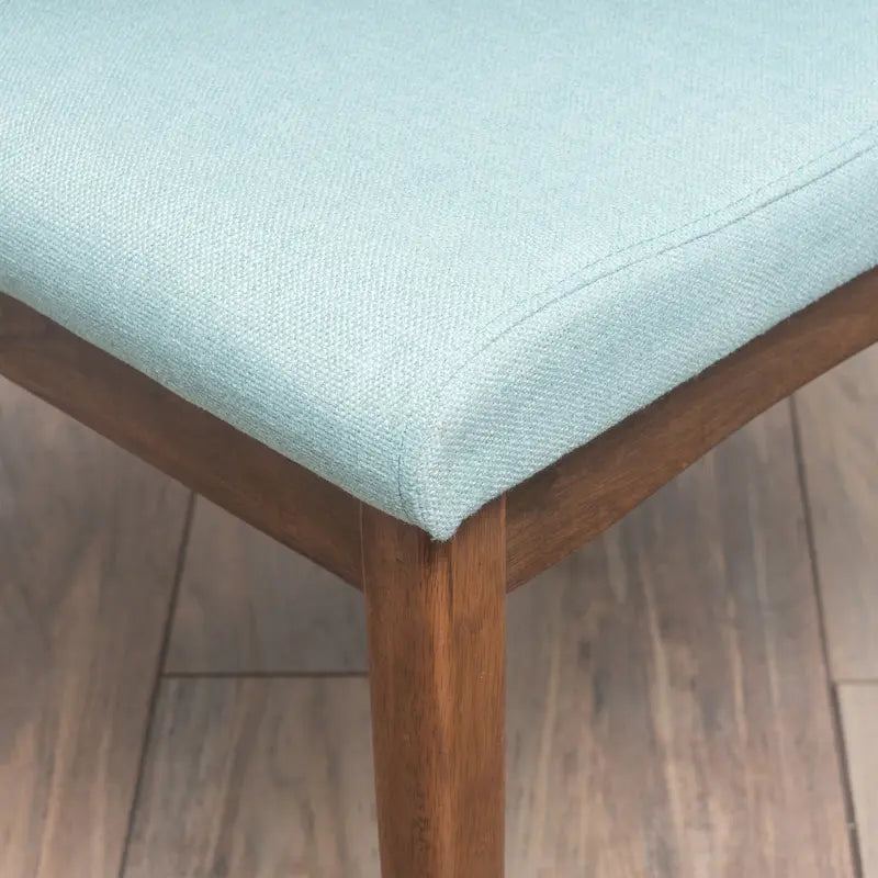 Chaise de salle à manger tapissée en tissu de style milieu du siècle avec pieds en bois massif