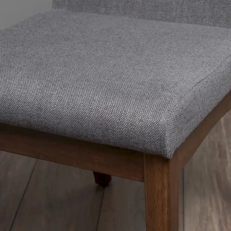 Chaise de salle à manger tapissée en tissu de style milieu du siècle avec pieds en bois massif
