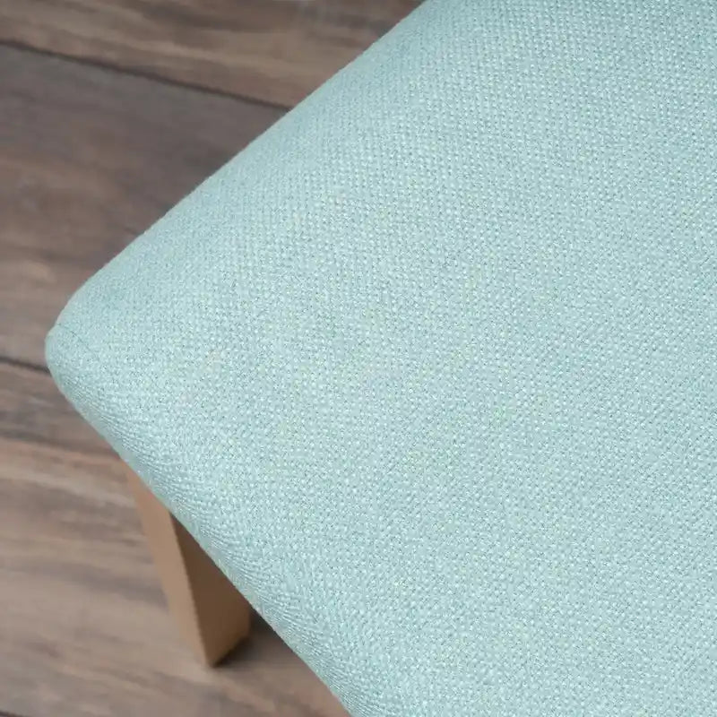 Chaise de salle à manger tapissée en tissu de style milieu du siècle avec pieds en bois massif