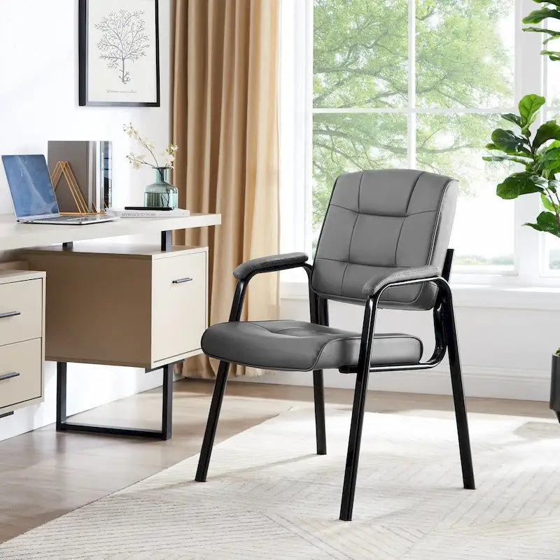 Chaise de bureau en similicuir rembourrée avec accoudoirs et structure métallique